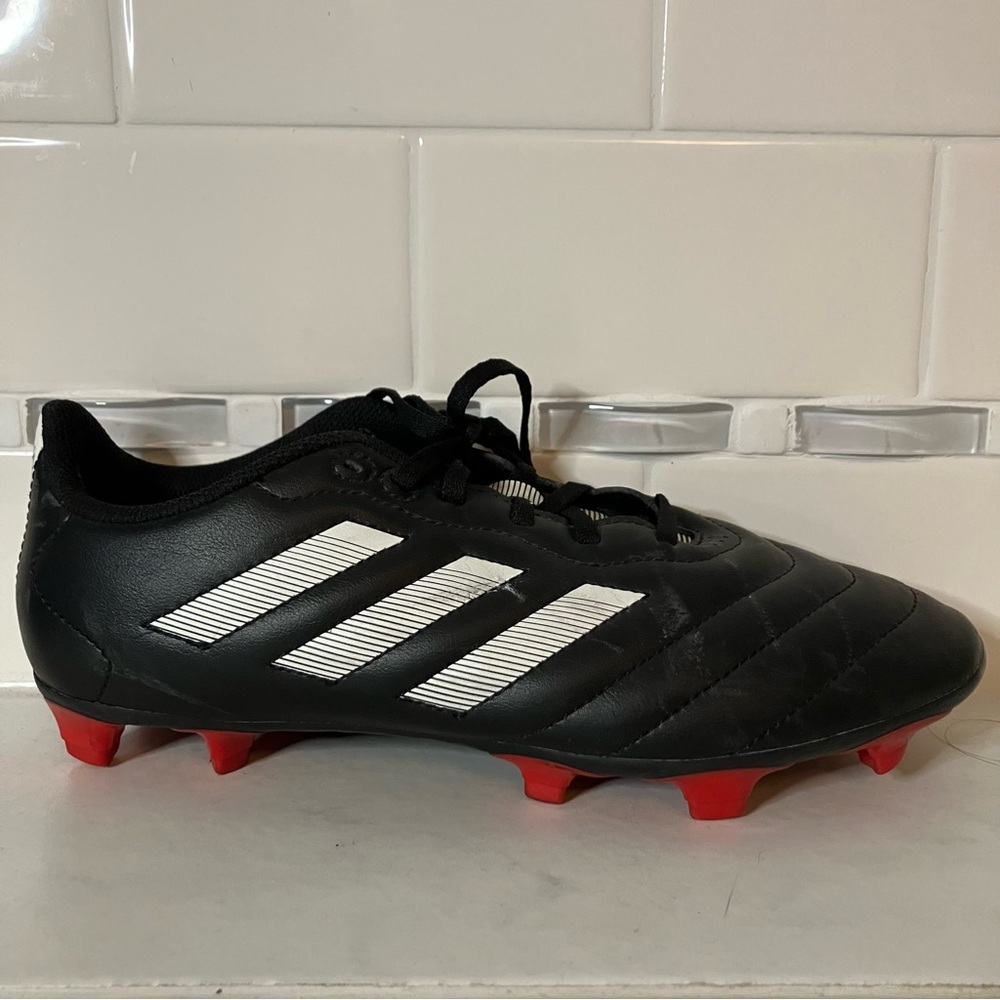 Adidas Black Soccer Cleats with Red Soles